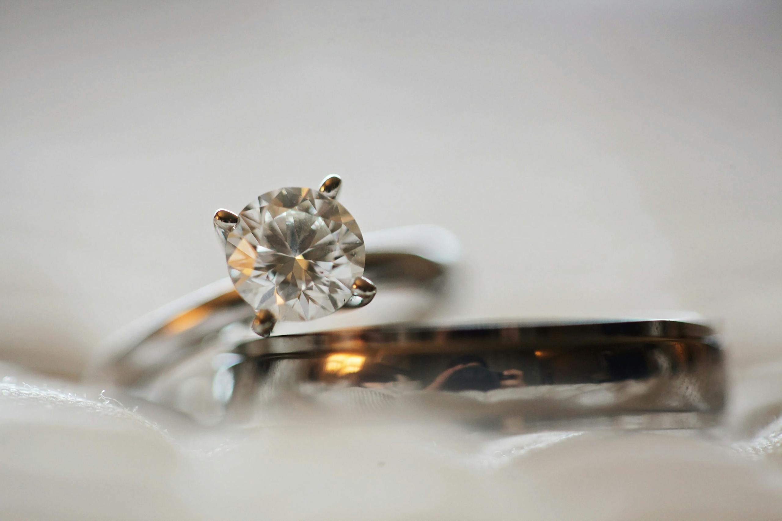 Close Up Photo of Diamond Stud Silver-colored Eternity Ring